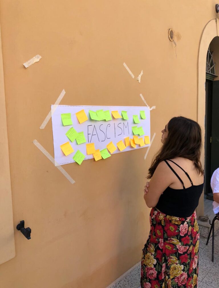 A girl looking at the notes in the wall