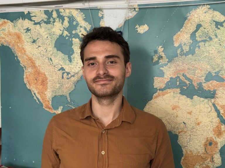 Albanoi smiling