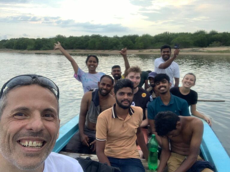 PEOPLE SMILING ON A BOAT