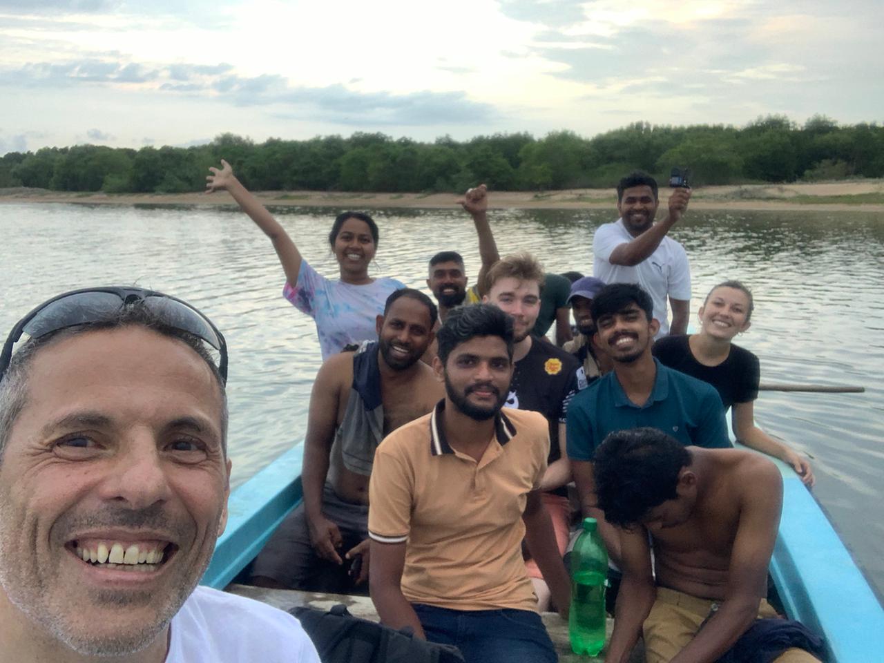 PEOPLE SMILING ON A BOAT
