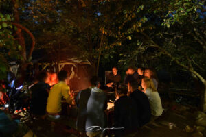People gathered in a campfire
