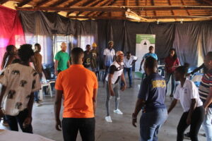 People gathered in a group at the The Southern Africa Workcamps Cooperation